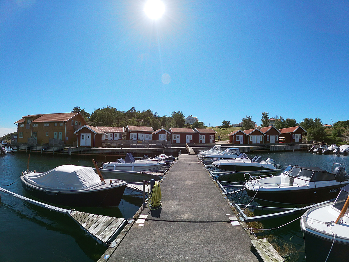 The Tången private harbour. Beach to the right and deep bathing place to the left of the yellow warehouse